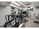 Fitness center featuring modern cardio machines and mirrored walls for motivation and progress tracking at 130 N Pearl St # 1103, Denver, CO 80203
