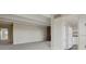 Spacious, bright carpeted living room with fireplace, and open access to the kitchen at 130 N Pearl St # 1103, Denver, CO 80203