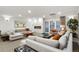 Spacious living area with fireplace, neutral color palette and modern decor at 130 N Pearl St # 1103, Denver, CO 80203