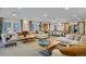Relaxing living room with large sectional sofa, billiard table and stylish decor at 130 N Pearl St # 1103, Denver, CO 80203