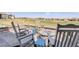 Inviting outdoor firepit area with comfortable seating, ideal for entertaining friends and Gathering in a tranquil setting at 15842 Willow St, Thornton, CO 80602