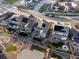 Aerial view of modern homes with solar panels and well-maintained yards in a suburban neighborhood at 8354 Big Thompson St, Littleton, CO 80125