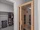 Walk in closet with functional home sauna; well organized with shelving and ample storage space at 8354 Big Thompson St, Littleton, CO 80125