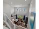 A bird's eye view of an open floor plan featuring a dining room, living room and den at 8354 Big Thompson St, Littleton, CO 80125