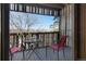 Cozy balcony with mountain views, furnished with a table and chairs at 2525 S Dayton Way # 1514, Denver, CO 80231