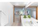 Bright bathroom with views to the living area and the natural light at 2525 S Dayton Way # 1514, Denver, CO 80231