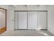 Bedroom features generous storage with large closet doors at 2525 S Dayton Way # 1514, Denver, CO 80231