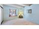 Bright bedroom features a window seat, plush carpet, and neutral wall paint at 2525 S Dayton Way # 1514, Denver, CO 80231