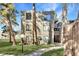 Charming apartment building surrounded by mature trees and grassy lawns providing natural beauty at 2525 S Dayton Way # 1514, Denver, CO 80231