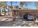 Carport with a parking spot and a parked car at 2525 S Dayton Way # 1514, Denver, CO 80231
