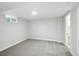 Finished basement space featuring recessed lighting and neutral-toned carpeting at 8701 E Briarwood Blvd, Centennial, CO 80112