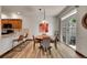 Bright dining area with sliding door access to a small backyard space at 2972 W Long Dr # C, Littleton, CO 80120
