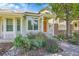 Charming home exterior with a landscaped front yard and a cozy entrance at 2972 W Long Dr # C, Littleton, CO 80120