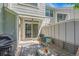 Cozy patio featuring outdoor seating, a grill, and sliding glass doors for indoor-outdoor living at 2972 W Long Dr # C, Littleton, CO 80120