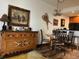 Charming dining area features a round table, decorative lighting, and adjacent kitchen bar at 34 Highfield Trl # 212, Breckenridge, CO 80424