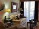 Comfortable living room showcases natural light, stylish lamps, and rustic décor at 34 Highfield Trl # 212, Breckenridge, CO 80424