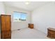 Bedroom with natural light, classic furniture, and neutral carpet flooring at 16275 Electra St, Brighton, CO 80603