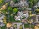 Aerial view of the expansive home and surrounding landscape at 4 Redhawk Run, Englewood, CO 80113