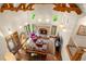 Bright living room with wood beams, fireplace, and leather furniture set at 4 Redhawk Run, Englewood, CO 80113