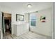 Clean bedroom featuring a wardrobe and a well-lit window with blinds at 4754 N Joplin St, Denver, CO 80239