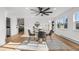 Inviting dining space with wood floors, modern chairs, and an open floor plan at 1406 Pika Rd, Boulder, CO 80302