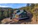 Striking two-story home with multi-level deck and mountain views at 1406 Pika Rd, Boulder, CO 80302