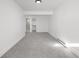 Neutral room with carpet and doors to walk-in closet and bath at 1406 Pika Rd, Boulder, CO 80302