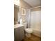 Clean bathroom featuring a modern sink and vanity, a framed picture, and shower with tub at 19803 Victorian Way, Parker, CO 80138