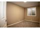 Bedroom with neutral paint, carpeted floors, and window at 19803 Victorian Way, Parker, CO 80138