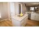 Kitchen island with granite countertop, complemented by stainless steel appliances and modern finishes at 19803 Victorian Way, Parker, CO 80138