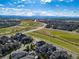 Panoramic aerial view showcasing community, parks, and mountain views at 5399 Valentia St, Denver, CO 80238