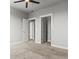 Bedroom with access to walk-in closet and ensuite bathroom at 5399 Valentia St, Denver, CO 80238