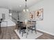 Bright dining room with modern lighting and stylish decor at 5399 Valentia St, Denver, CO 80238