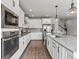 Well-equipped kitchen featuring granite countertops and stainless steel appliances at 5399 Valentia St, Denver, CO 80238
