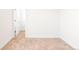 Bright bedroom featuring a neutral carpet and a door into a closet at 23293 E Jamison Dr, Aurora, CO 80016