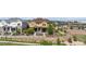 Beautiful two-story home with a manicured lawn and tasteful landscaping at 23293 E Jamison Dr, Aurora, CO 80016