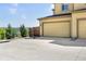 Attached two-car garage and wide driveway with ample parking space at 23293 E Jamison Dr, Aurora, CO 80016