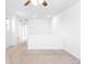 Bright loft area features neutral carpet and white walls perfect for flexible living at 23293 E Jamison Dr, Aurora, CO 80016