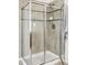 Bathroom glass shower with tile surround at 4915 Sage Brush Dr, Broomfield, CO 80023