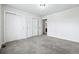 Spacious bedroom featuring three closets and neutral carpeting at 4915 Sage Brush Dr, Broomfield, CO 80023