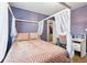 Stylish bedroom featuring a four poster bed and adjacent closet at 4915 Sage Brush Dr, Broomfield, CO 80023