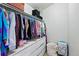 Walk-in closet featuring ample storage space with built-in drawers and hanging racks at 4915 Sage Brush Dr, Broomfield, CO 80023