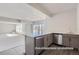 Finished basement with modern bar, sink, dishwasher, and sleek gray cabinets at 9752 Canyon Wind Pt, Parker, CO 80138