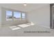 Well-lit bedroom featuring bright windows with community views at 9752 Canyon Wind Pt, Parker, CO 80138
