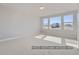 Spacious bedroom with large windows, perfect for relaxation and comfort at 9752 Canyon Wind Pt, Parker, CO 80138