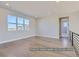 Upstairs bonus room features gorgeous floors and natural light from the large windows at 9752 Canyon Wind Pt, Parker, CO 80138