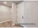 Entryway featuring wood floors, white door, and closet storage at 9752 Canyon Wind Pt, Parker, CO 80138