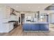 Modern kitchen with a large island, stainless steel appliances, and stylish cabinetry at 9752 Canyon Wind Pt, Parker, CO 80138