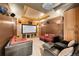 Entertainment room featuring a projector, screen, and comfortable seating; perfect for movie nights at 10231 Democrat Rd, Parker, CO 80134