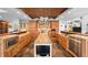 Spacious kitchen with granite countertops, stainless steel appliances, and brick barrel ceiling at 10231 Democrat Rd, Parker, CO 80134